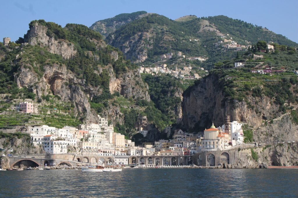 A picturesque town nestled by cliffs on the Amalfi Coast, Italy.